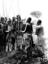 Ulikoro Konyonomora (Komor-a-kora) blessing duelling contestants.